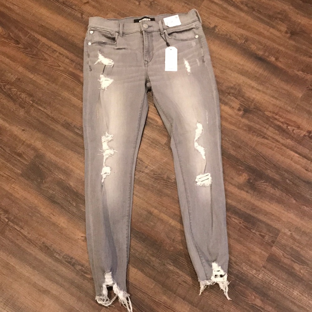 Grey distressed jeans. New!